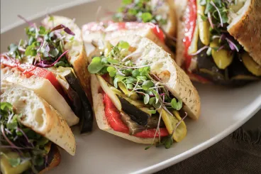 ciabatta sandwiches with fresh tomatoes and microgreens