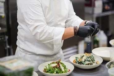 chef preparing various salads